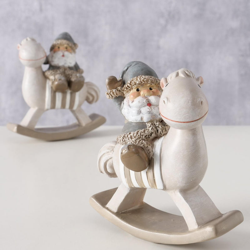 Laden Sie das Bild in Galerie -Viewer, Boltze home kerstman op schommelpaard hars h11cm