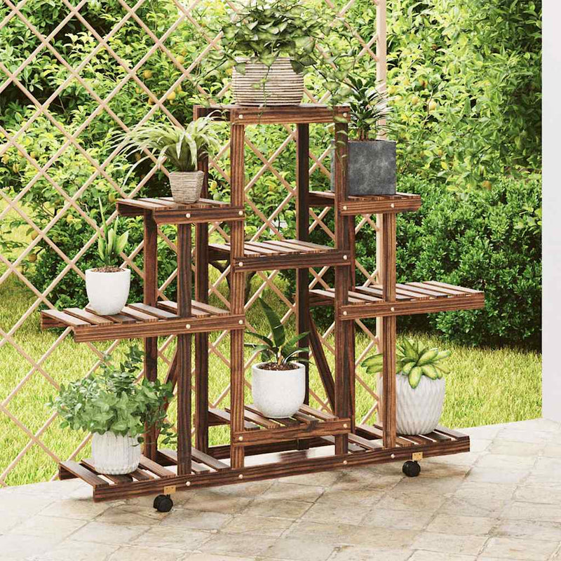 Load image into Gallery viewer, Vidaxl plantenstandaard met wielen 110x25x101 cm massief vurenhout