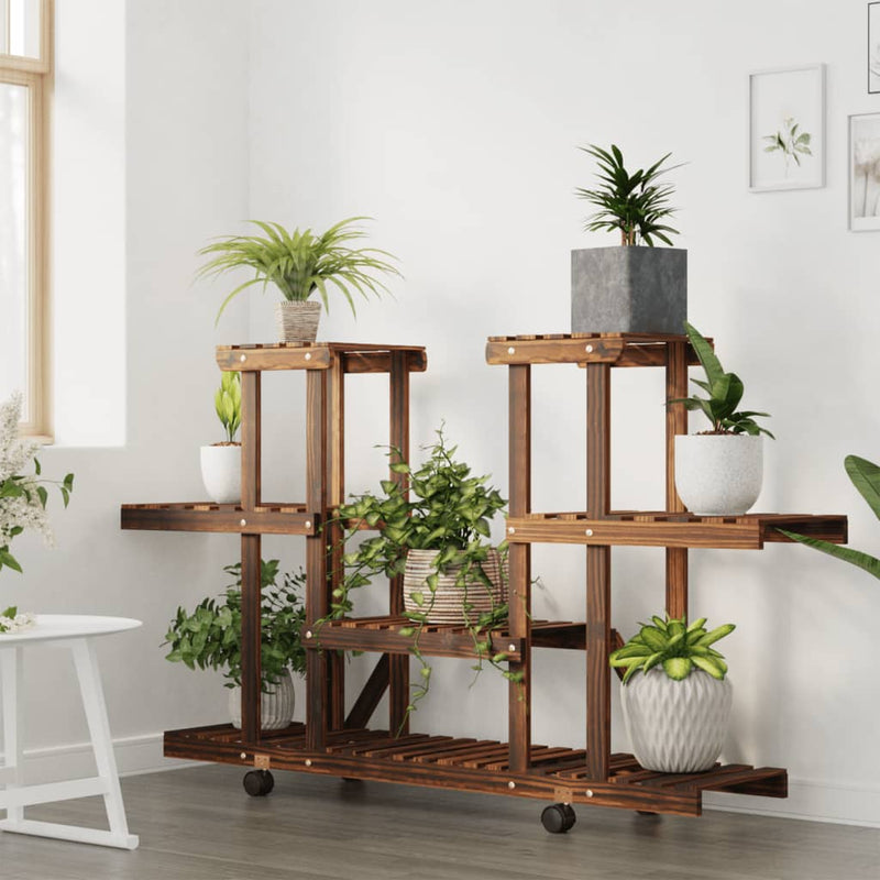 Load image into Gallery viewer, Vidaxl plantenstandaard met wielen 110x25x78 cm massief vurenhout