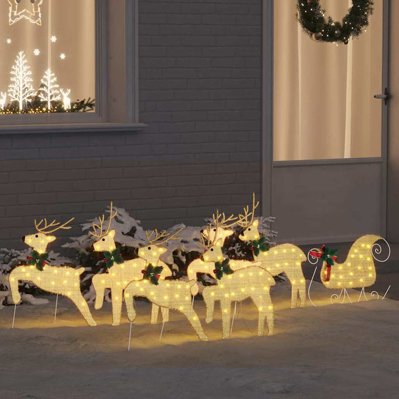Afbeelding laden in galerijviewer, Vidaxl led rendieren 7 pcs goud stof