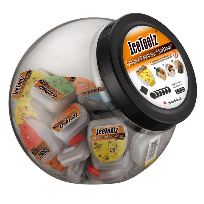 Load image into Gallery viewer, IceToolz Zelfklevende bandenplakkers AirDam 24056J5 50 doosjes à 6 stuks (in pot)