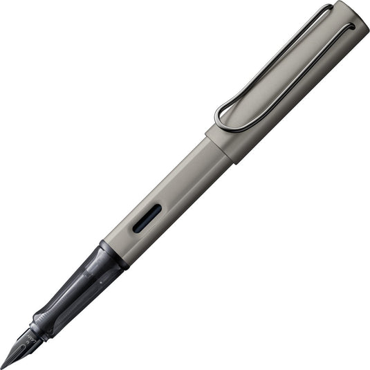 Lamy lx luxe vulpen 057 van licht aluminium in de kleur ruthenium met edelmetaalafwerking en glanzend zwarte pvd-stalen penpunt, inclusief t 10 inktpatroon in blauw en geschenkverpakking