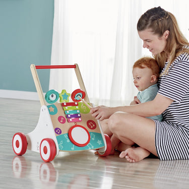 Hape muzikale loopwagen - loophulp met trommel, xylofoon en verstelbare weerstand - vanaf 10 maanden