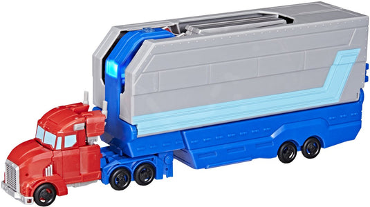 Hasbro transformers speelgoed earthspark optimus prime battle trailer robot.