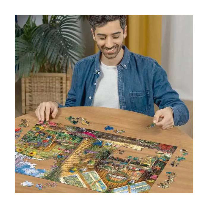 Afbeelding laden in galerijviewer, Ravensburger puzzel blik in het tuinhuis - legpuzzel - 300 stukjes extra groot
