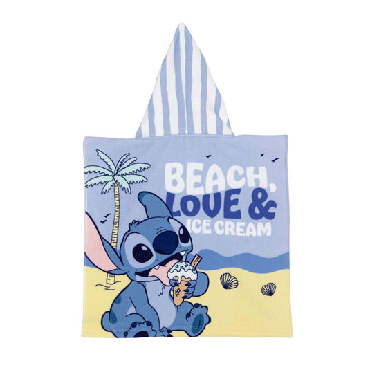 Handdoek poncho stitch op het strand