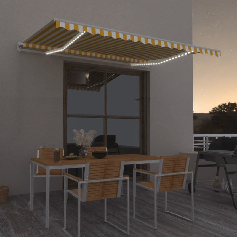 Load image into Gallery viewer, VidaXL Luifel handmatig uittrekbaar met LED 450x350 cm geel en wit
