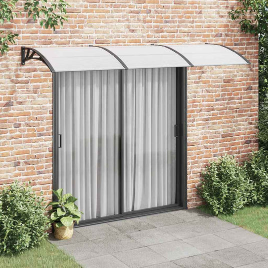 Vidaxl deurluifel 300x75 cm polycarbonaat zwart en transparant
