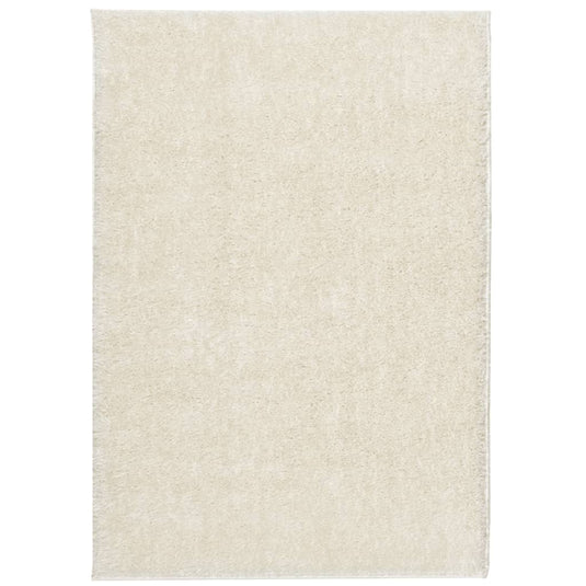Vidaxl vloerkleed istan hoogpolig glanzend 140x200 cm crèmekleurig