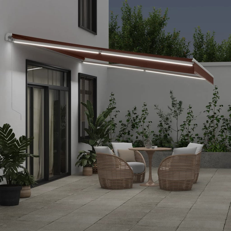 Load image into Gallery viewer, VidaXL Luifel handmatig uittrekbaar met LED 500x350 cm bruin
