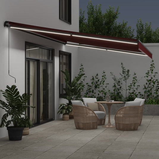 VidaXL Luifel handmatig uittrekbaar met LED's 600x300 cm bordeauxrood