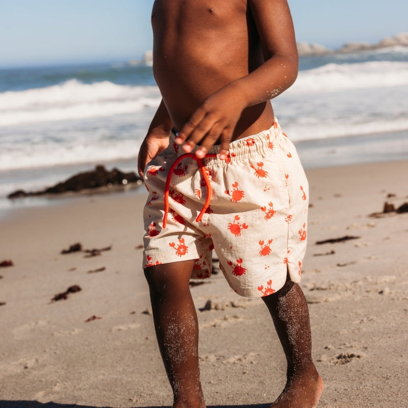 Load image into Gallery viewer, Crabby | beige rode uv zwembroek jongens
