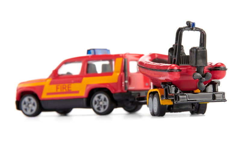 Load image into Gallery viewer, Siku brandweerwagen land rover defender met reddingsboot
